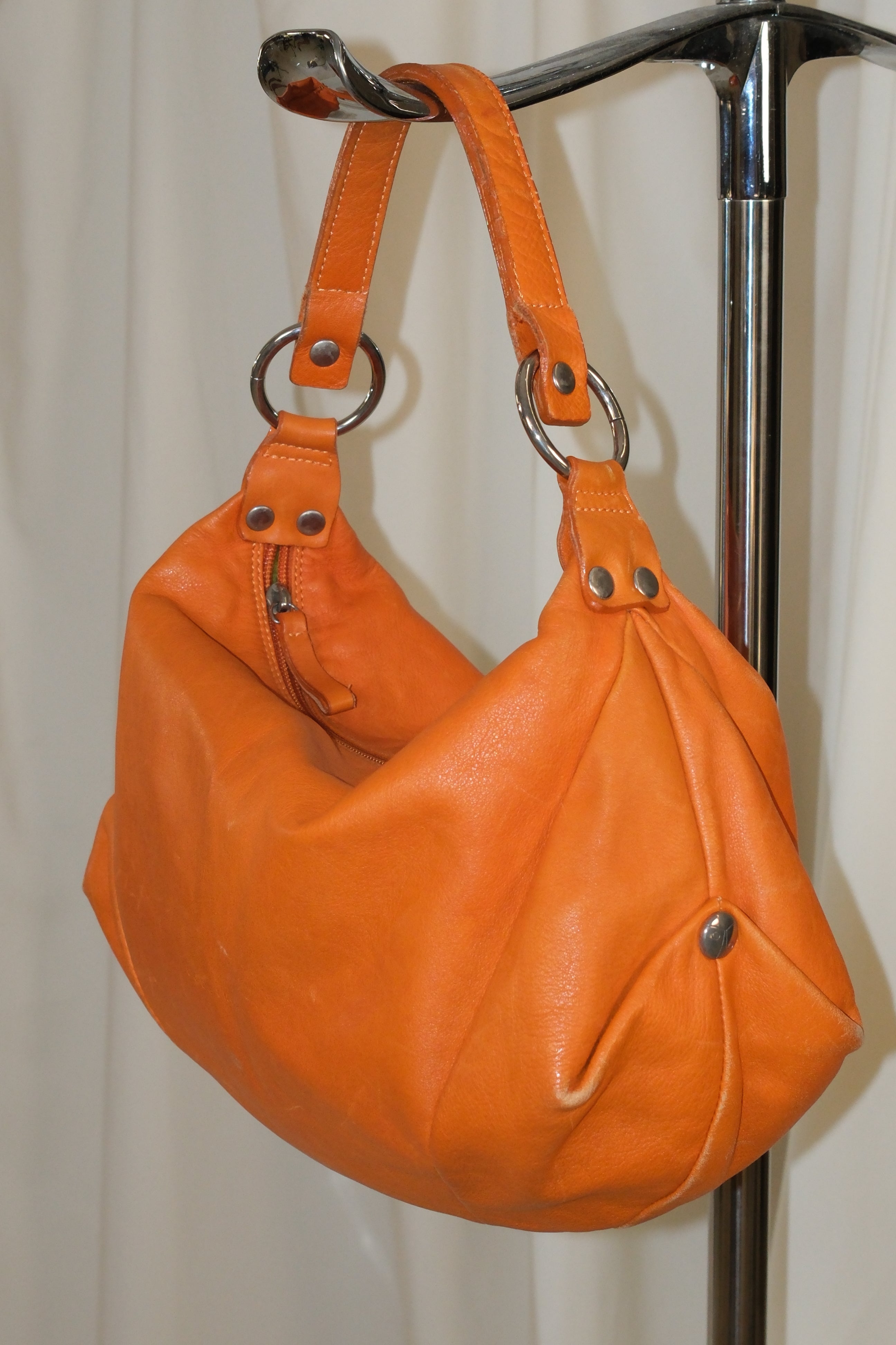 COCCINELLE PUFFY SHOULDER BAG IN ORANGE LEATHER