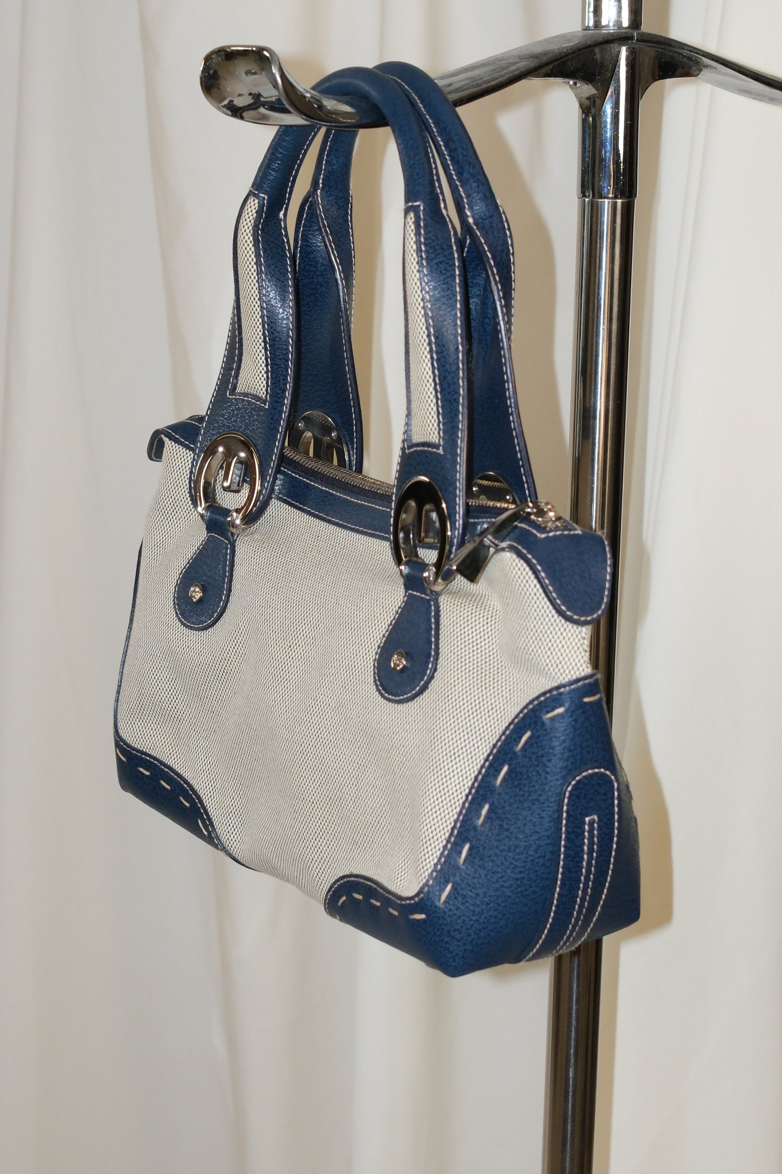 Escada elegance canvas and navy blue handbag eith signature logo metals