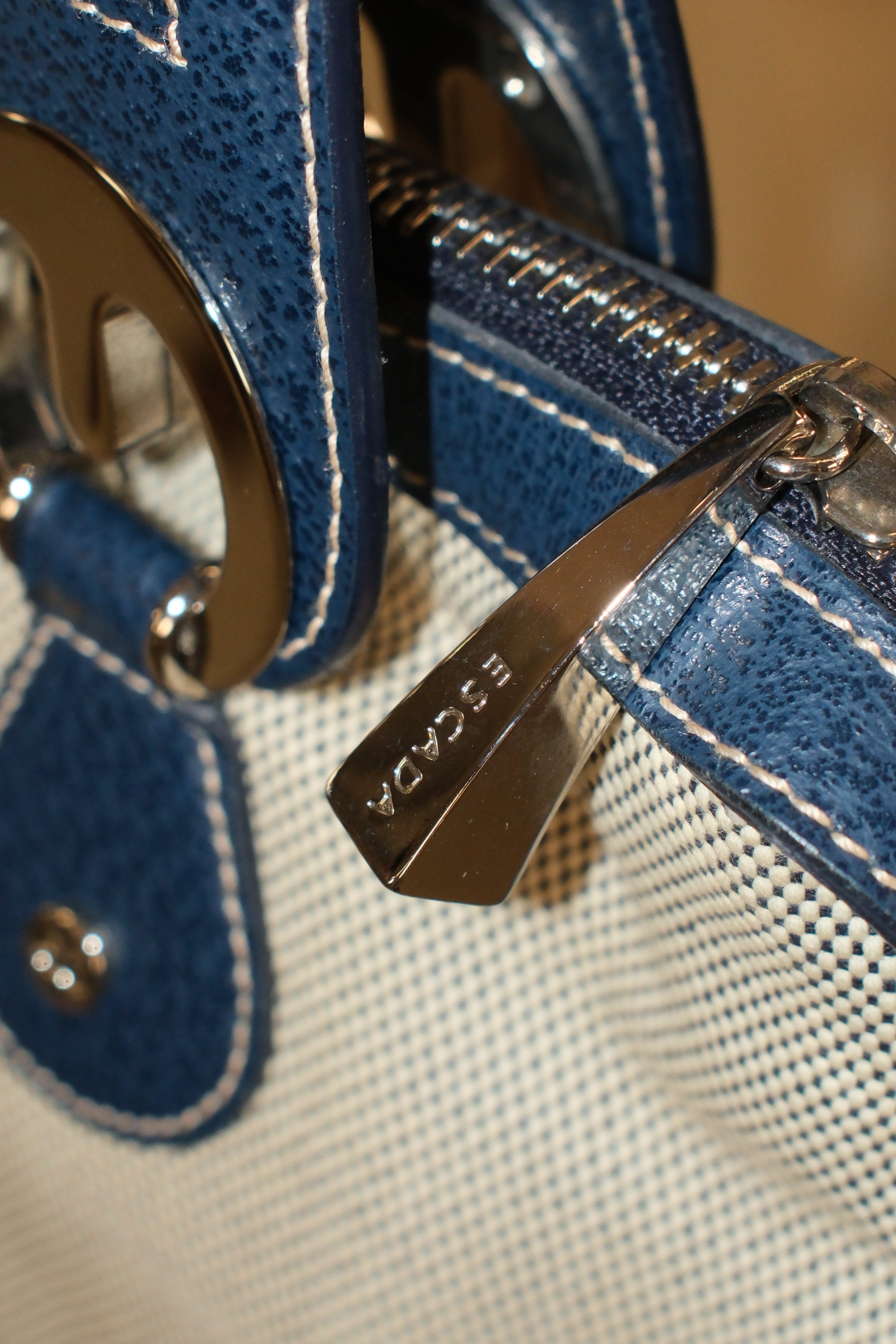 Escada elegance canvas and navy blue handbag eith signature logo metals