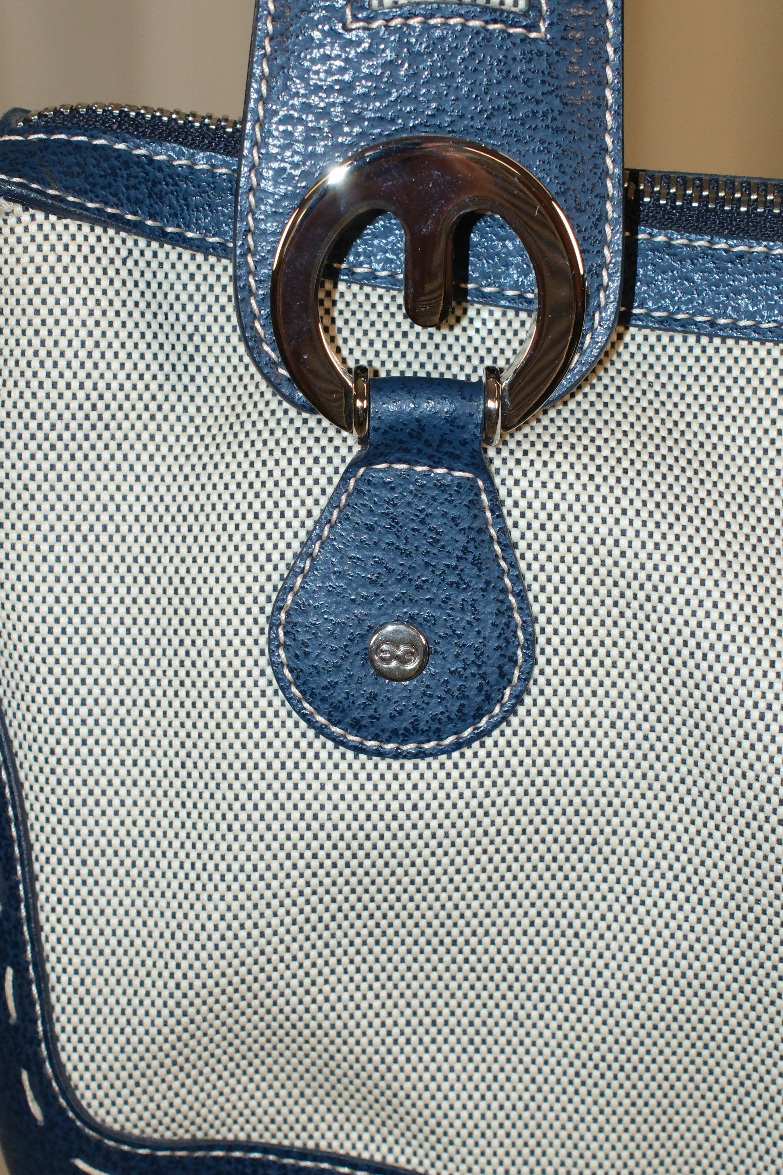 Escada elegance canvas and navy blue handbag eith signature logo metals