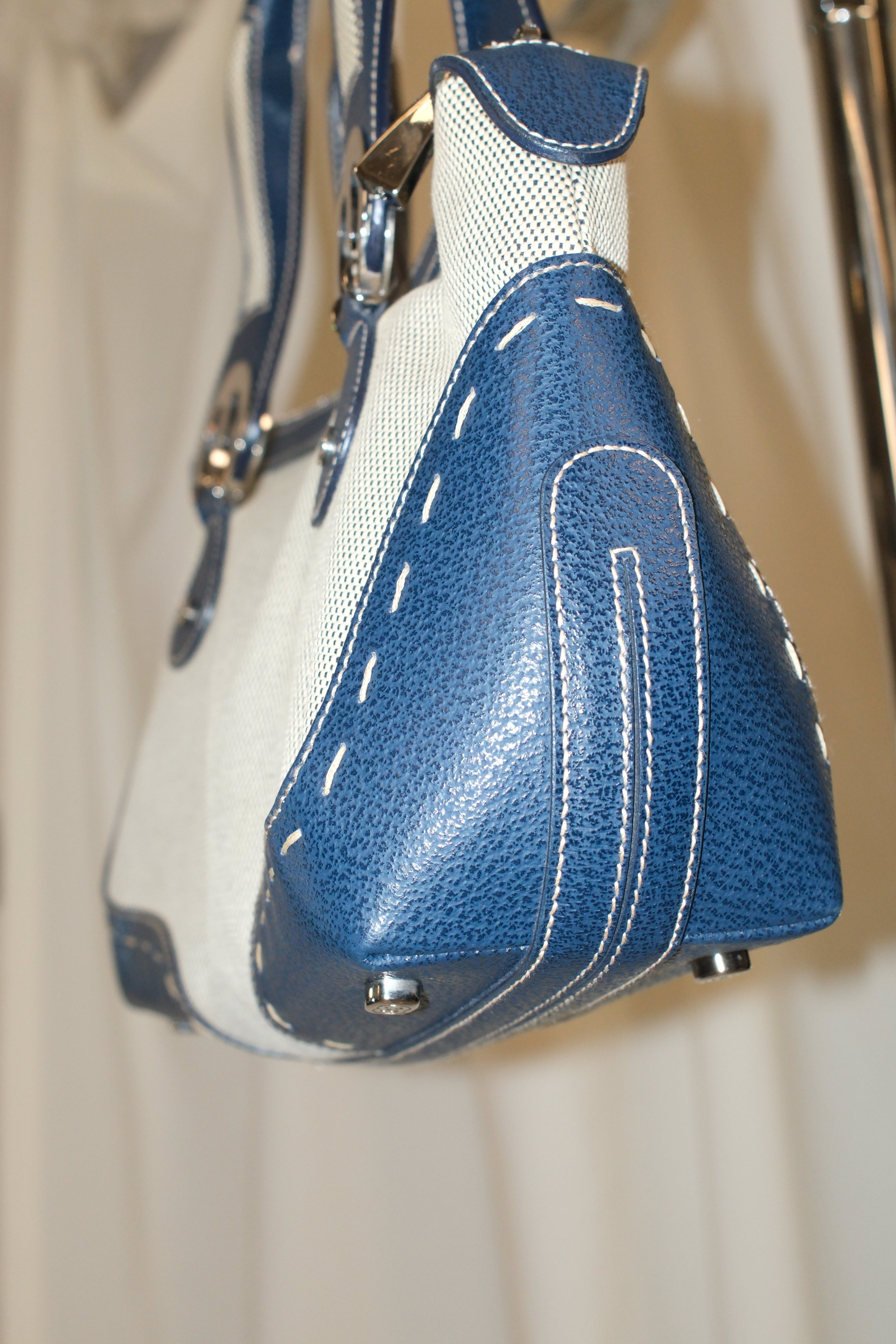 Escada elegance canvas and navy blue handbag eith signature logo metals