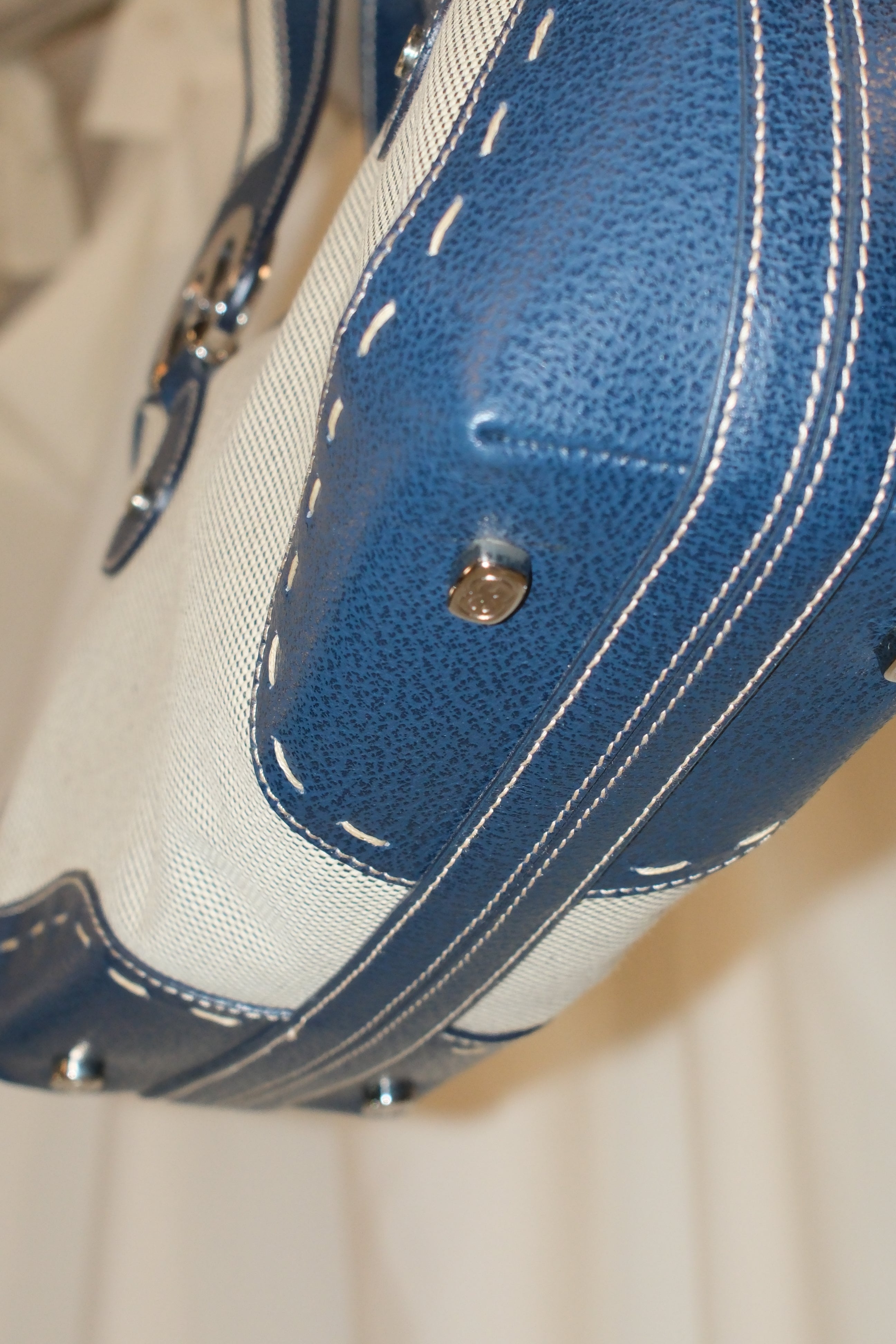 Escada elegance canvas and navy blue handbag eith signature logo metals