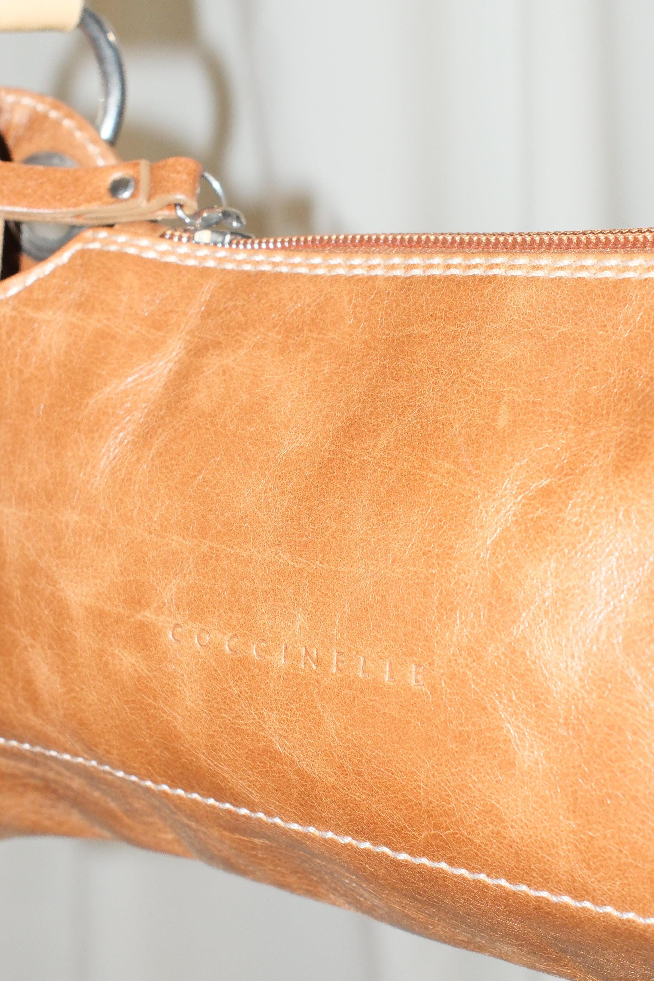 Coccinelle brown leather bag with cream stiff handle