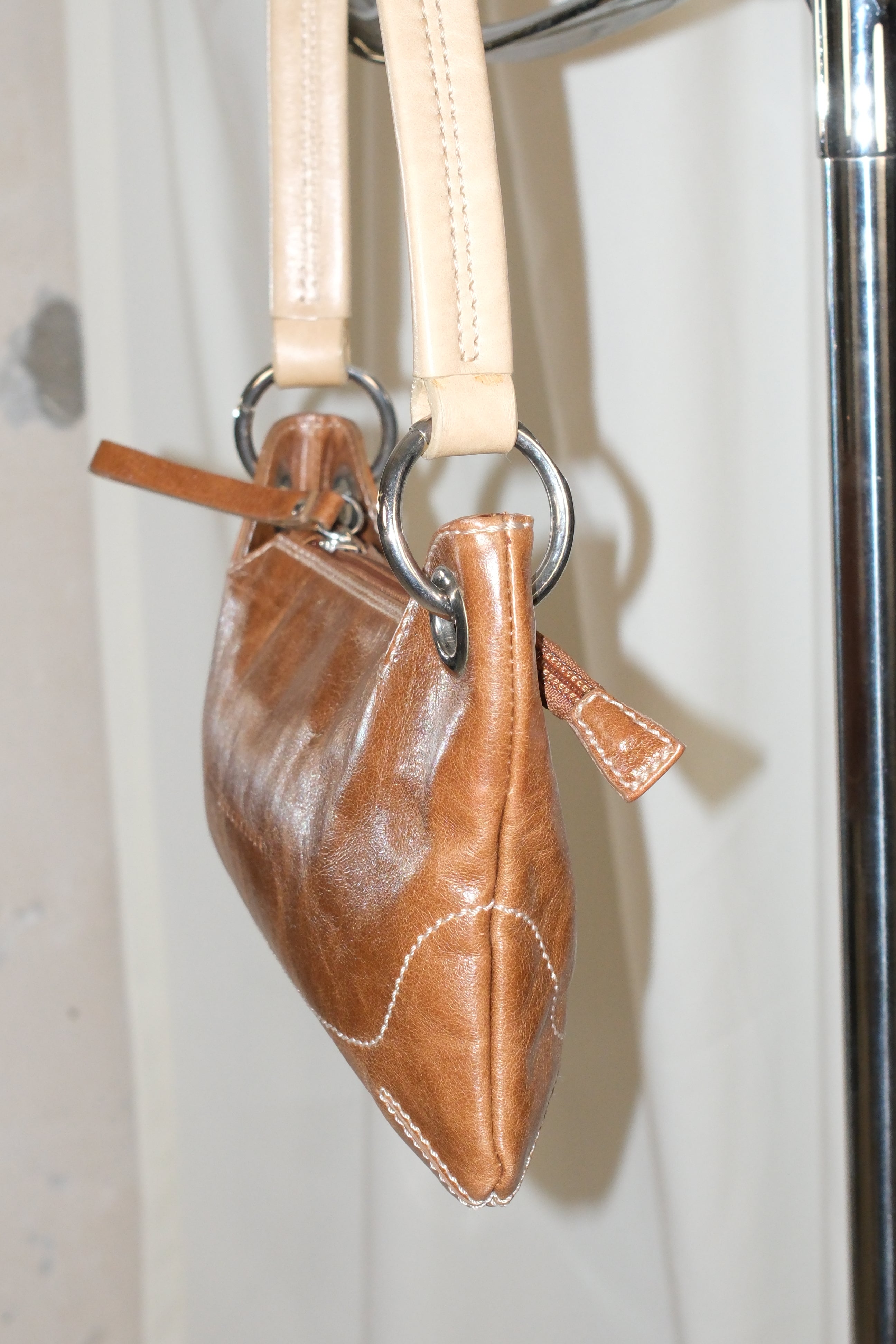 Coccinelle brown leather bag with cream stiff handle