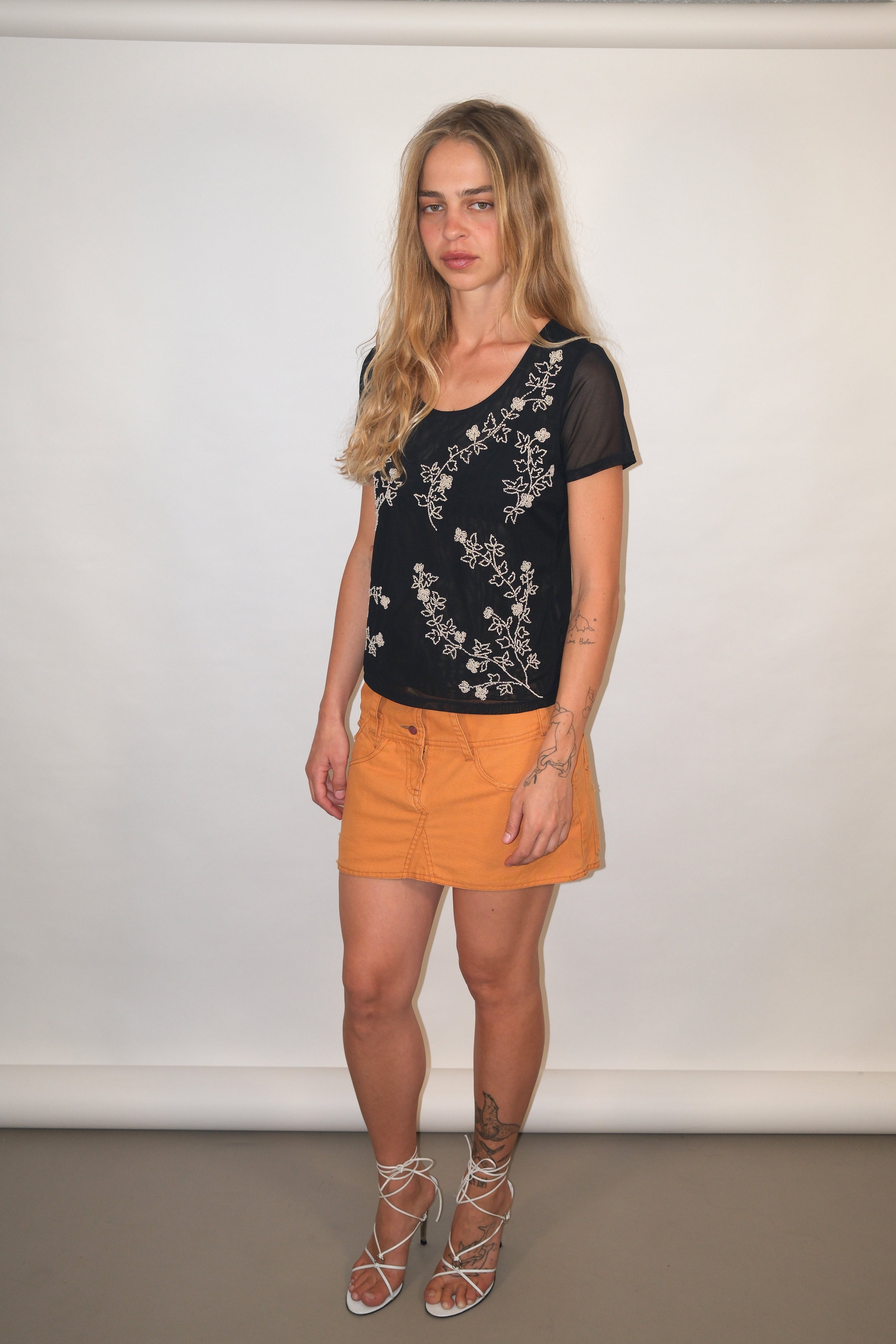Black Sheer Short-Sleeve Top With White Floral Details