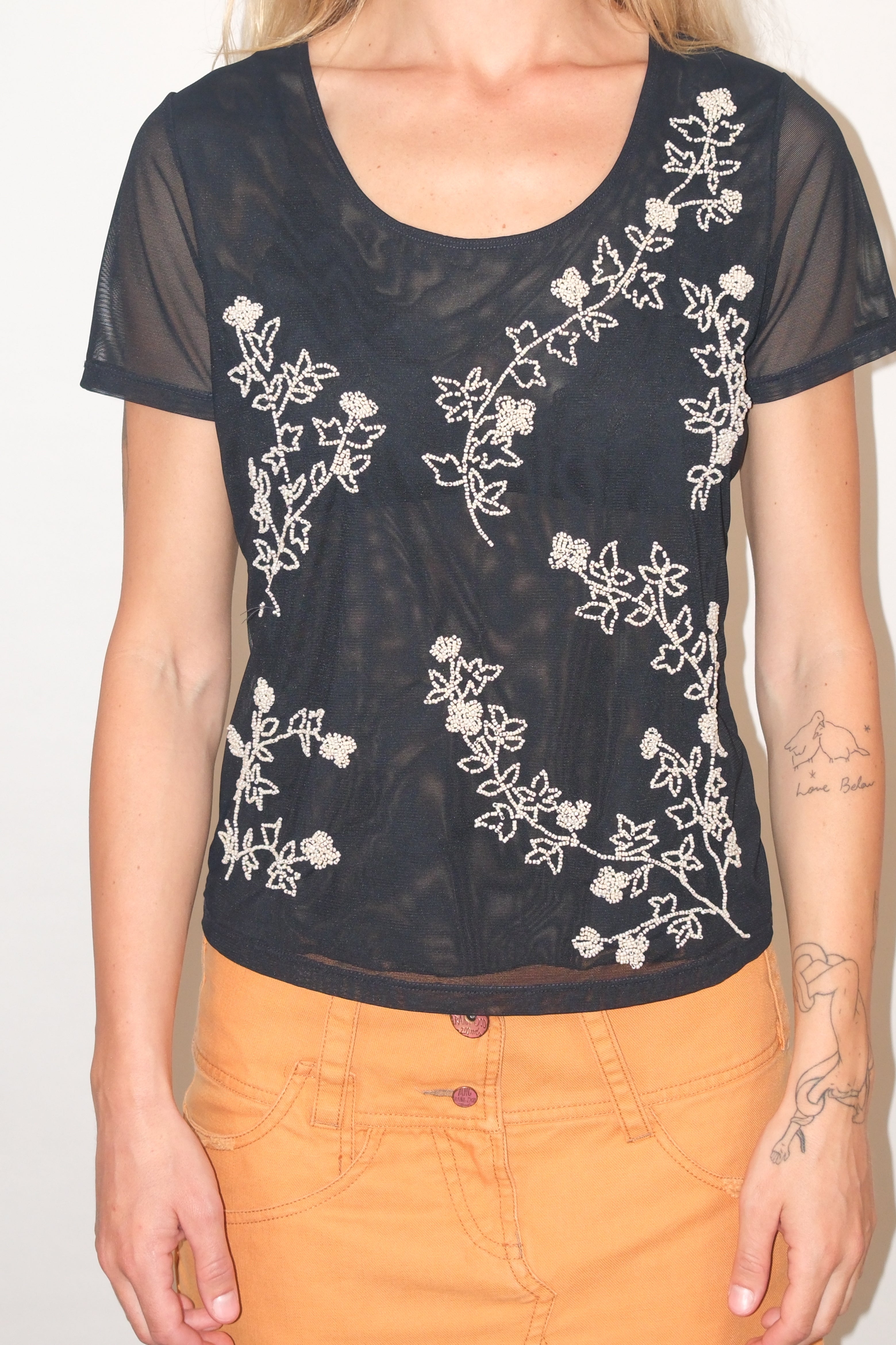Black Sheer Short-Sleeve Top With White Floral Details