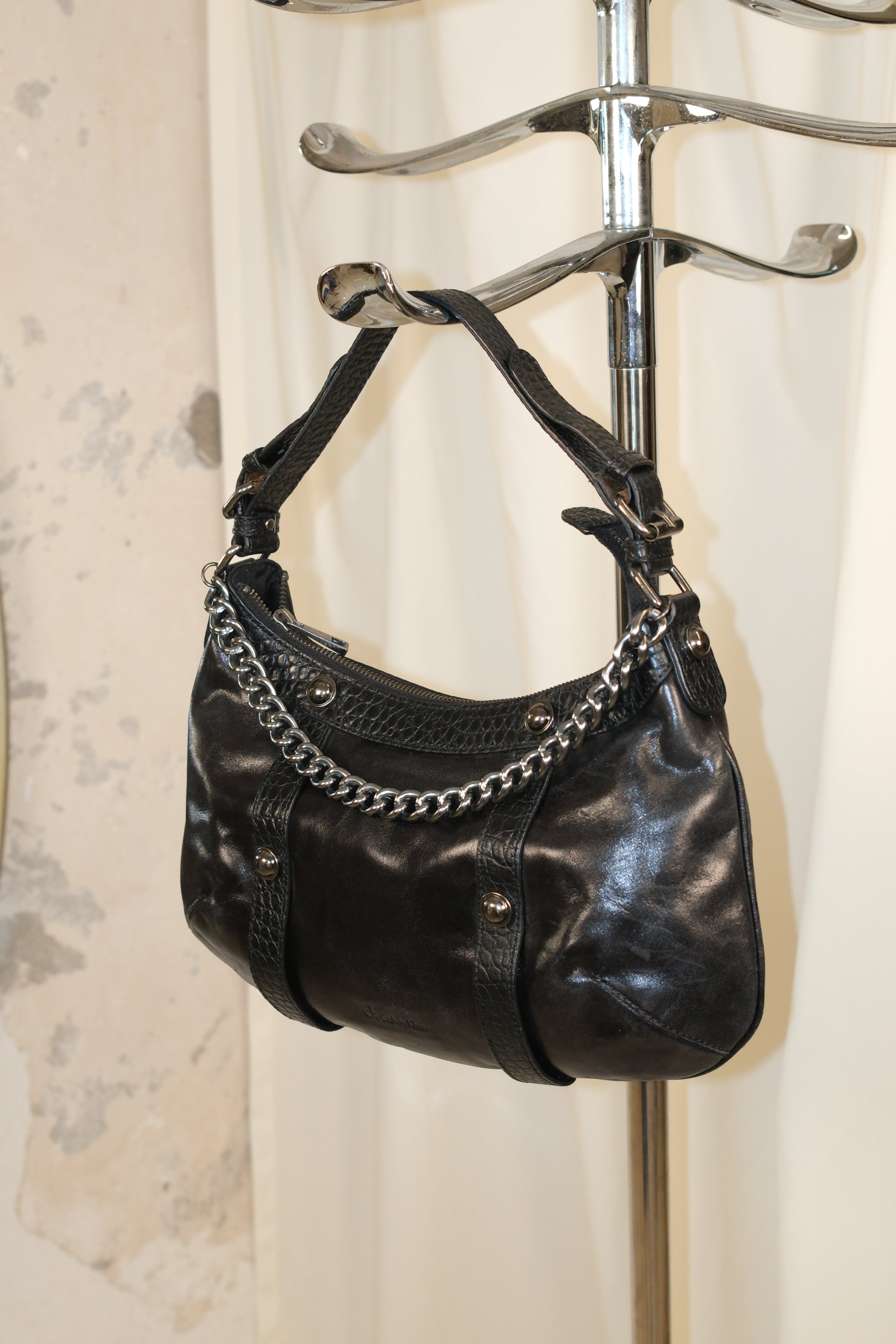 Calvin Klein Black Leather Shoulder Bag with Silver Chain Strap in Rock ’n’ Roll Style