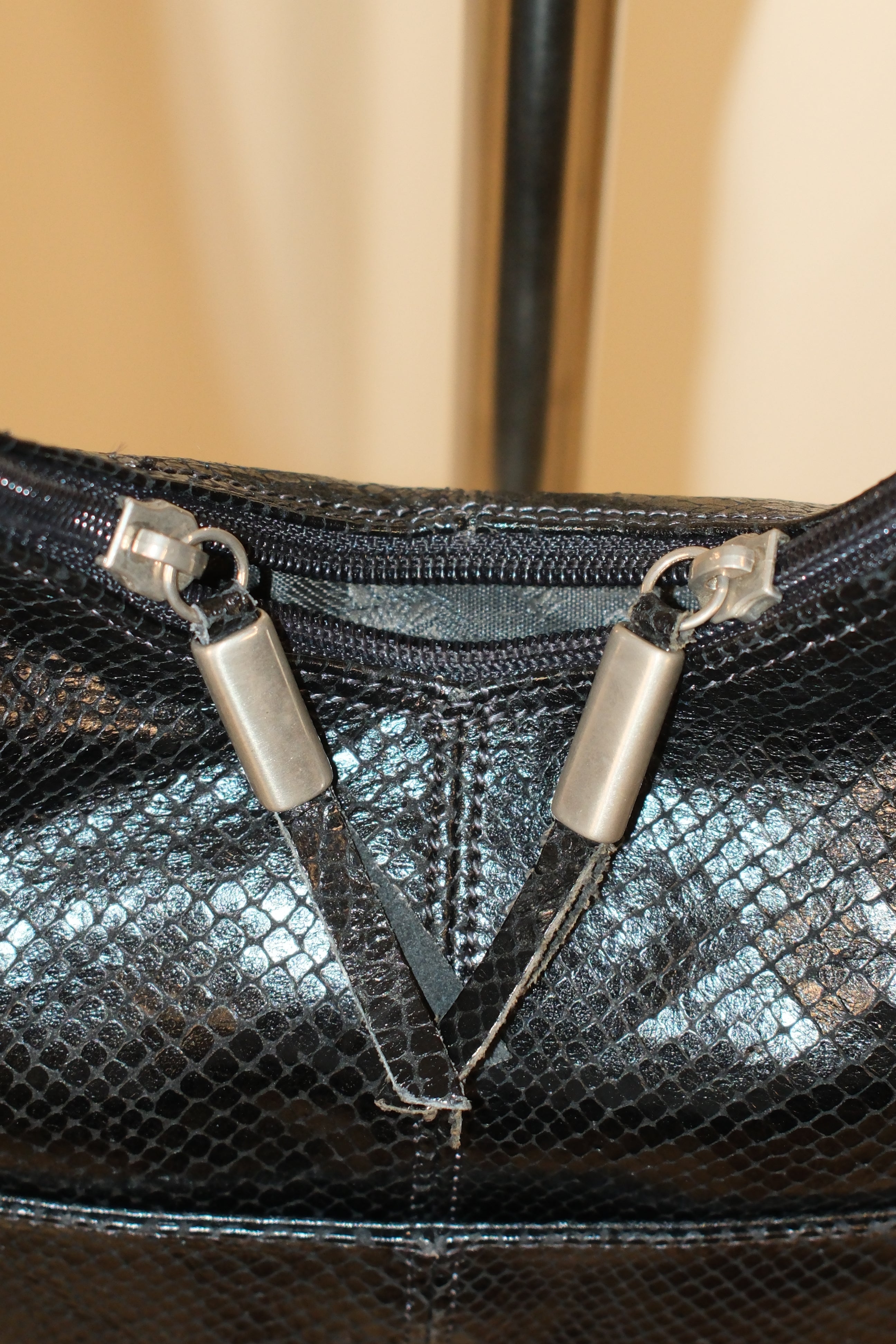 Francesco Biasia black crossbody bag in polished snake textures
