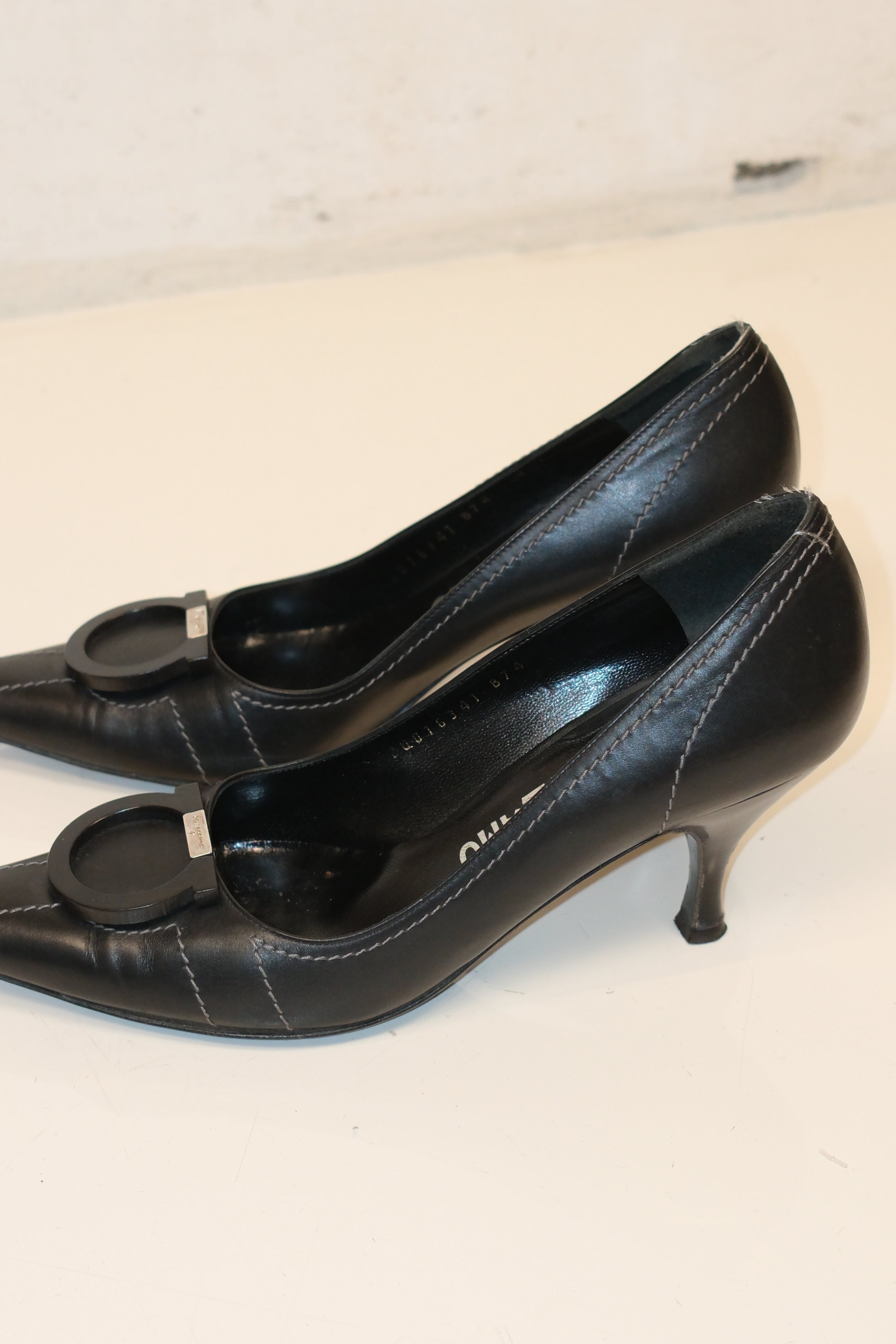 Ferragamo black pointed toe pumps with Gancini signature logo detail size 37