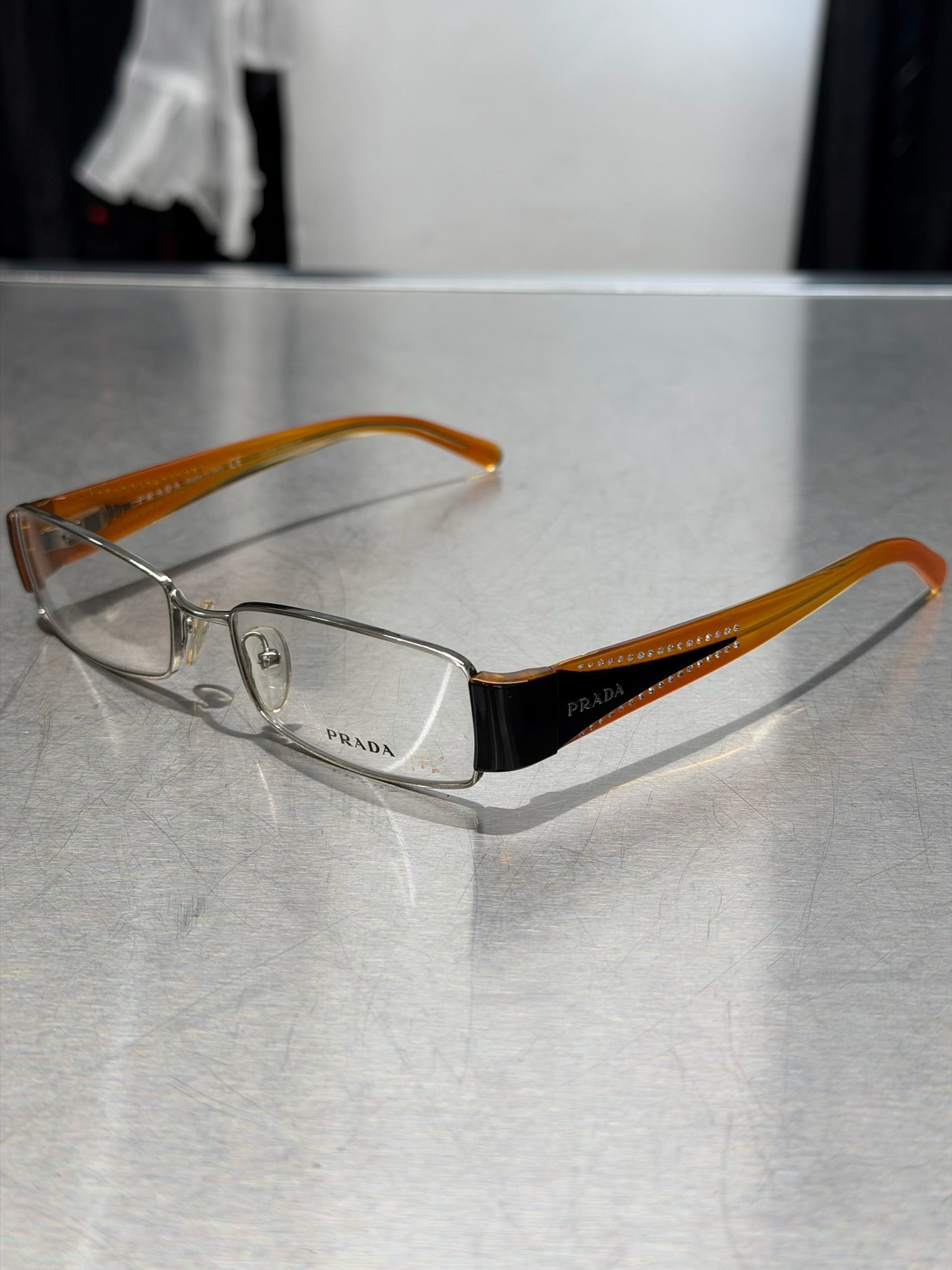 PRADA SILVER GLASSES WITH ORANGE AND BLACK TEMPLES AND RHINESTONES
