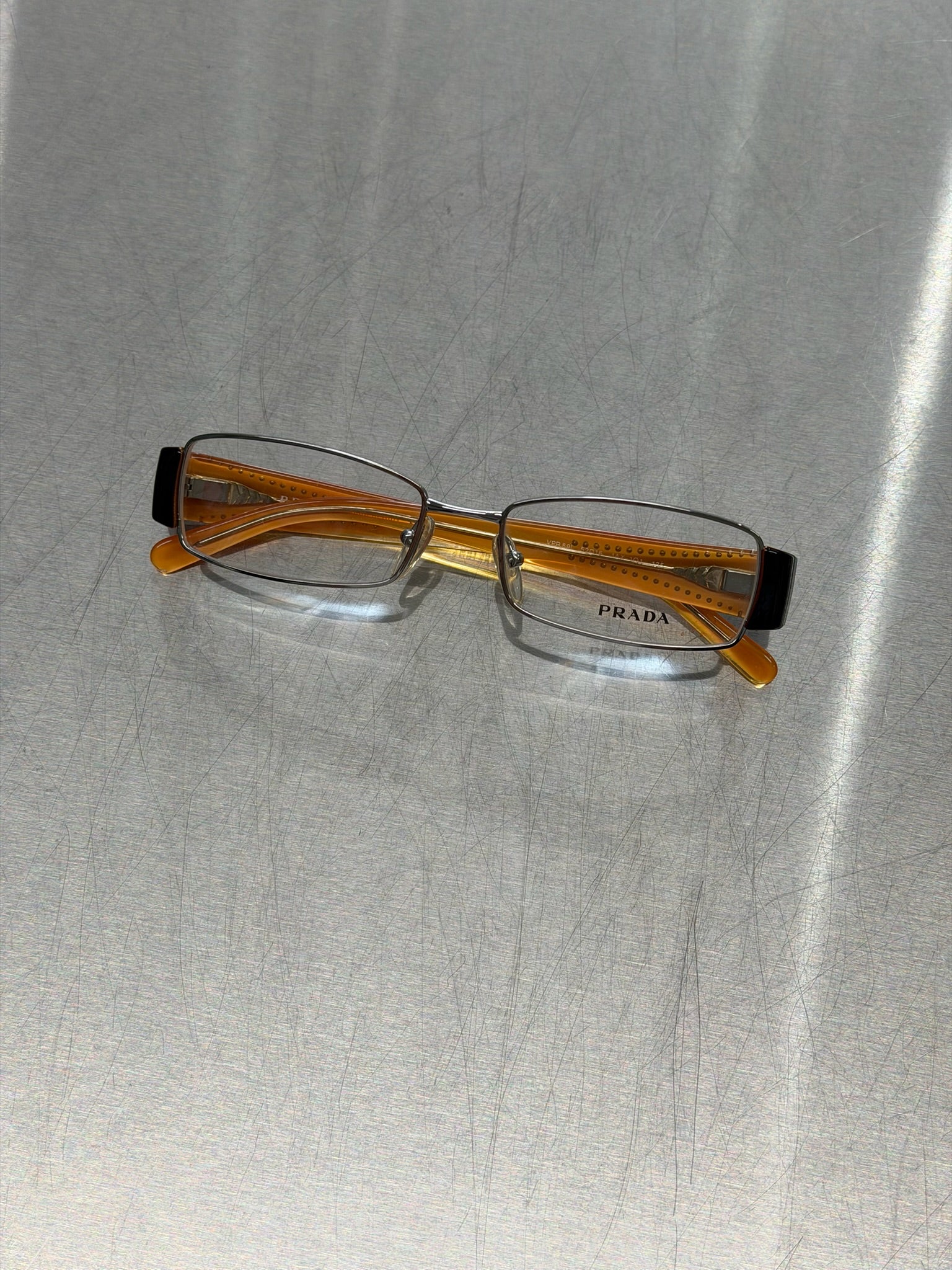 PRADA SILVER GLASSES WITH ORANGE AND BLACK TEMPLES AND RHINESTONES